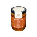 A glass jar of Mahalaxmi Farms 'Ethics Jackfruit Pickle' with a black lid and an orange label, set against a plain white background.